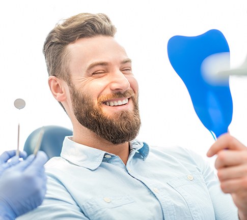 Patient in Conyers smiling after successful gum disease treatment at Hillcrest Dentistry 