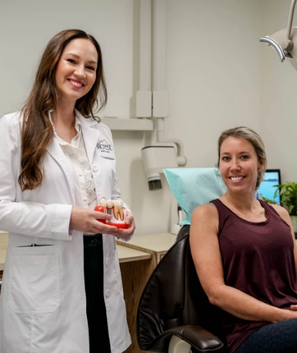 woman and baby talking to doctor