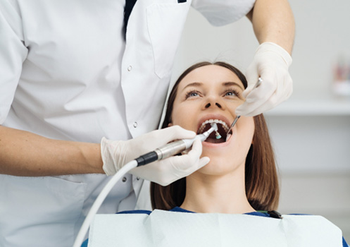 Female patient undergoing a dental 
